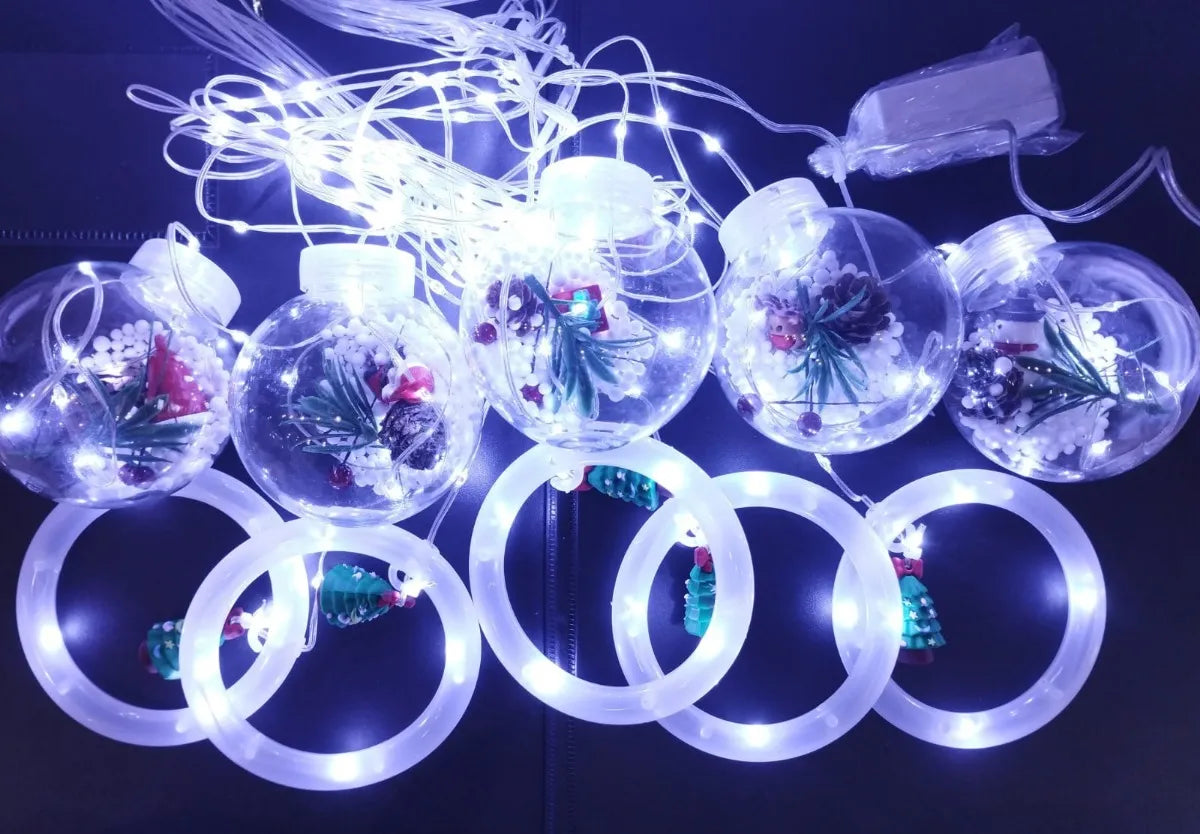Cortina Navideña LED con Figuras 3D – Anillos y Esferas Decoradas + Control de Color Incluido.
