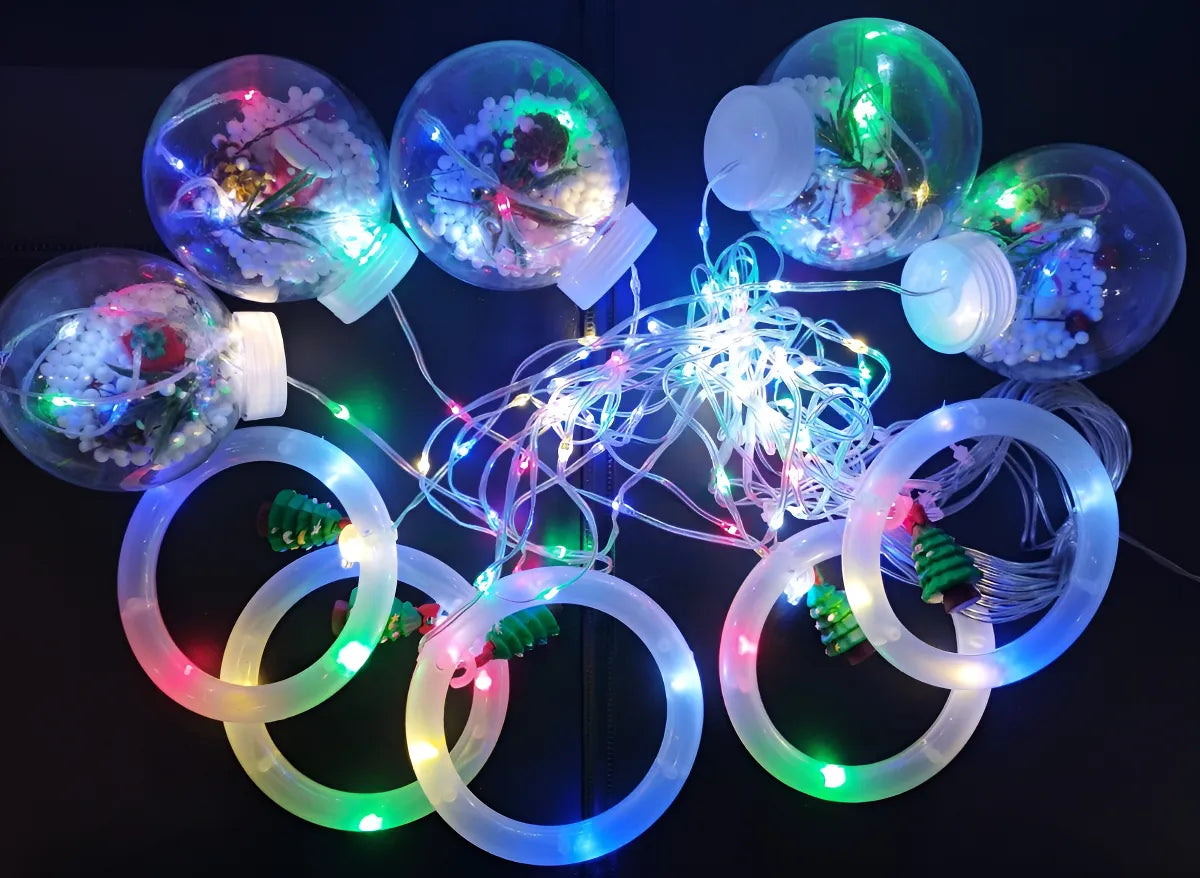 Cortina Navideña LED con Figuras 3D – Anillos y Esferas Decoradas + Control de Color Incluido.