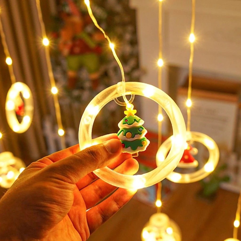 Cortina Navideña LED con Figuras 3D – Anillos y Esferas Decoradas + Control de Color Incluido.